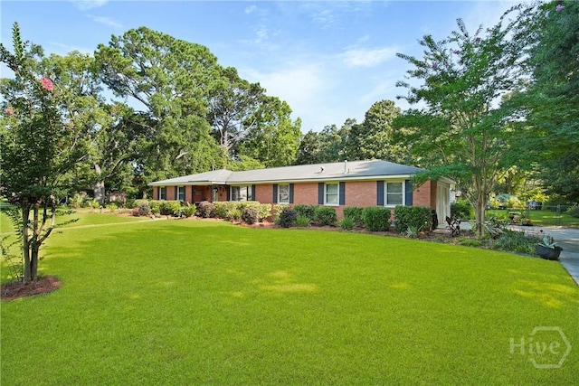 206 Devonshire Rd, Savannah, GA 31410 - ranch-style house with a front lawn and brick siding