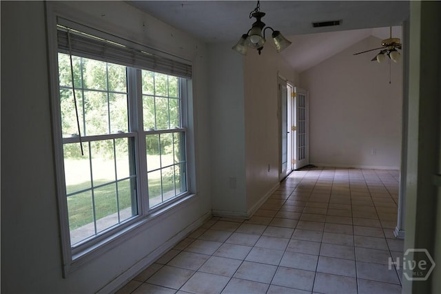 803 Jamestowne Rd, Savannah, GA 31419 - corridor featuring healthy amount of natural light, light tile patterned floors, vaulted ceiling, and a chandelier