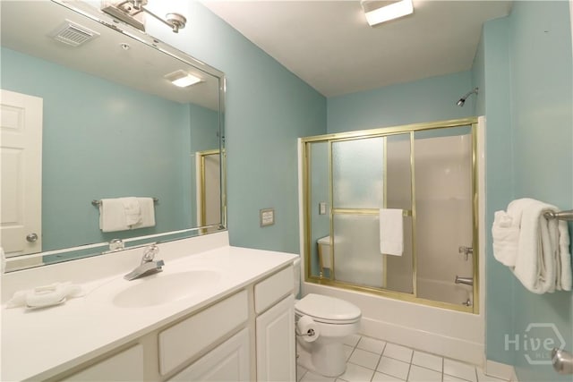 1615 Strand Ave Unit 4, Tybee Island, GA 31328 - bathroom featuring tile patterned floors, vanity, and combined bath / shower with glass door