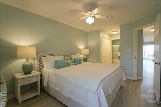 1615 Strand Ave Unit 4, Tybee Island, GA 31328 - bedroom featuring wood finished floors, a closet, ceiling fan, and ensuite bathroom