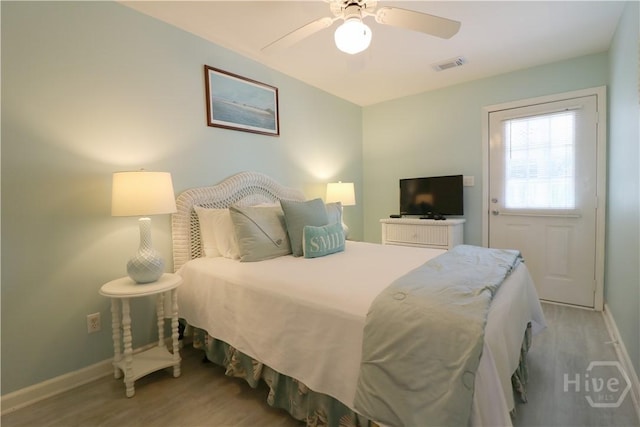 1615 Strand Ave Unit 4, Tybee Island, GA 31328 - bedroom with light wood finished floors and a ceiling fan