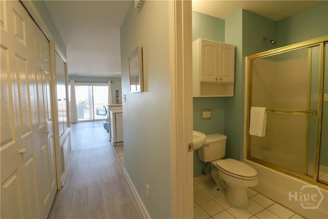 1615 Strand Ave Unit 4, Tybee Island, GA 31328 - bathroom featuring bath / shower combo with glass door and vanity