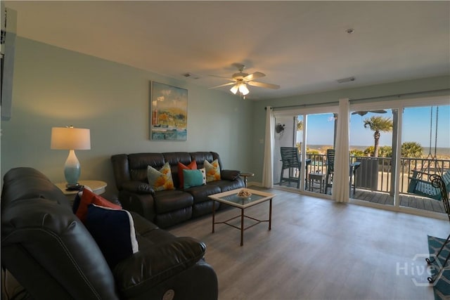 1615 Strand Ave Unit 4, Tybee Island, GA 31328 - living room with ceiling fan and wood finished floors