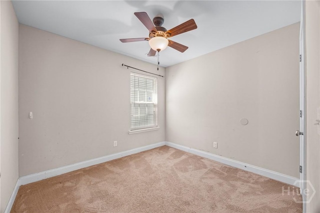 57 Fiore Dr, Savannah, GA 31419 - carpeted spare room with baseboards and a ceiling fan