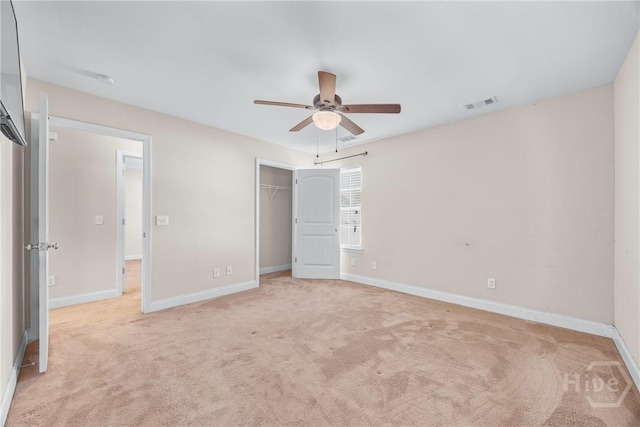 57 Fiore Dr, Savannah, GA 31419 - unfurnished bedroom with light colored carpet, a closet, and ceiling fan