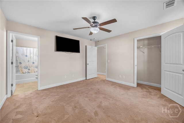 57 Fiore Dr, Savannah, GA 31419 - unfurnished bedroom featuring carpet floors, a closet, ensuite bathroom, and a ceiling fan