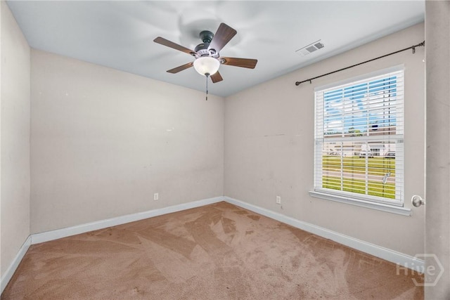 57 Fiore Dr, Savannah, GA 31419 - carpeted spare room with baseboards and a ceiling fan
