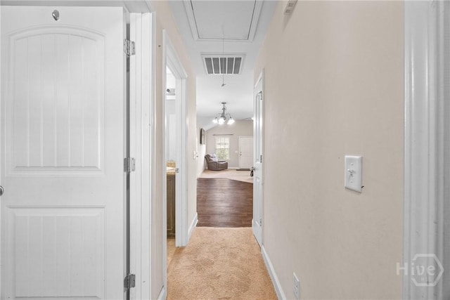 57 Fiore Dr, Savannah, GA 31419 - corridor featuring attic access and carpet flooring