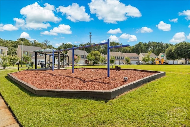 57 Fiore Dr, Savannah, GA 31419 - community play area with a lawn and a residential view