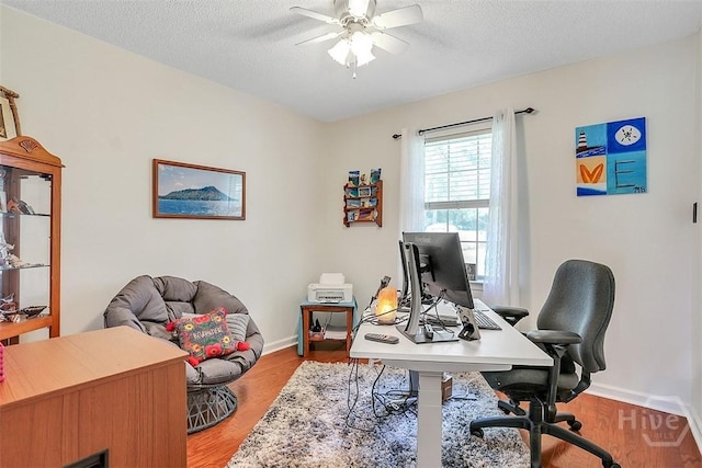 198 Jennifer Cir, Rincon, GA 31326 - office area with a ceiling fan, wood finished floors, and a textured ceiling