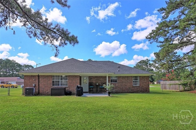 198 Jennifer Cir, Rincon, GA 31326 - rear view of property featuring a patio area, brick siding, and a shingled roof