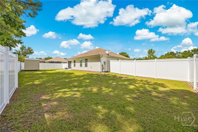 5 Winston Dr, Guyton, GA 31312 - fenced backyard with a storage shed