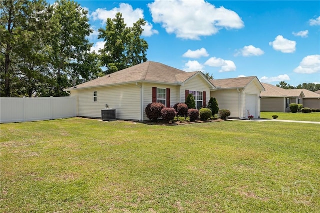 5 Winston Dr, Guyton, GA 31312 - view of property exterior with an attached garage and a central air condition unit