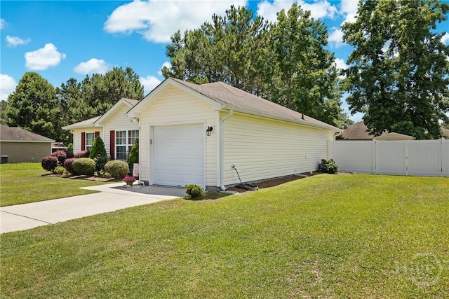 5 Winston Dr, Guyton, GA 31312 - view of home's exterior featuring an attached garage and concrete driveway