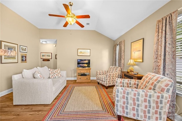 5 Winston Dr, Guyton, GA 31312 - living room with a ceiling fan, wood finished floors, and vaulted ceiling