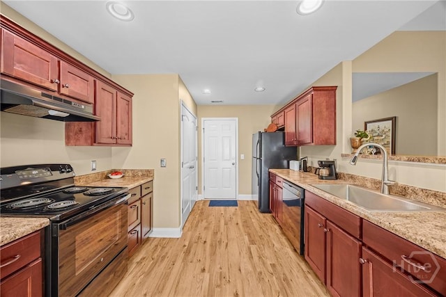 5 Winston Dr, Guyton, GA 31312 - kitchen featuring black appliances, under cabinet range hood, light wood-type flooring, recessed lighting, and dark brown cabinets