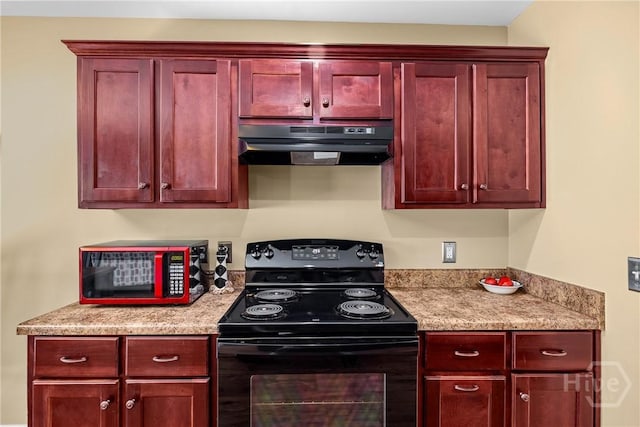 5 Winston Dr, Guyton, GA 31312 - kitchen with electric range, under cabinet range hood, and dark brown cabinets