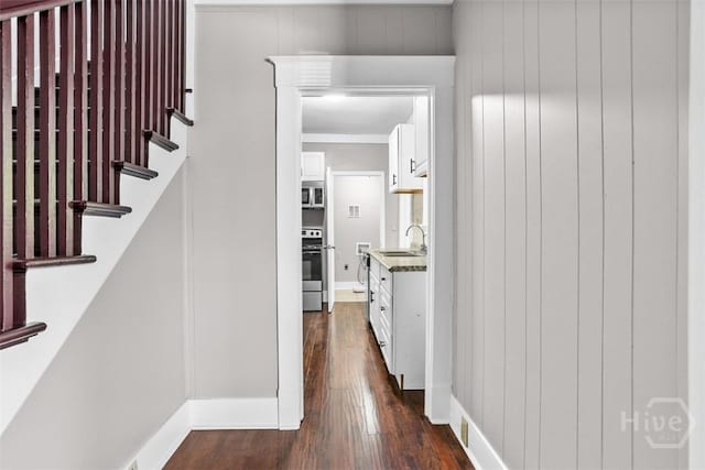 1104 E 40th St, Savannah, GA 31404 - corridor with dark wood finished floors and stairs