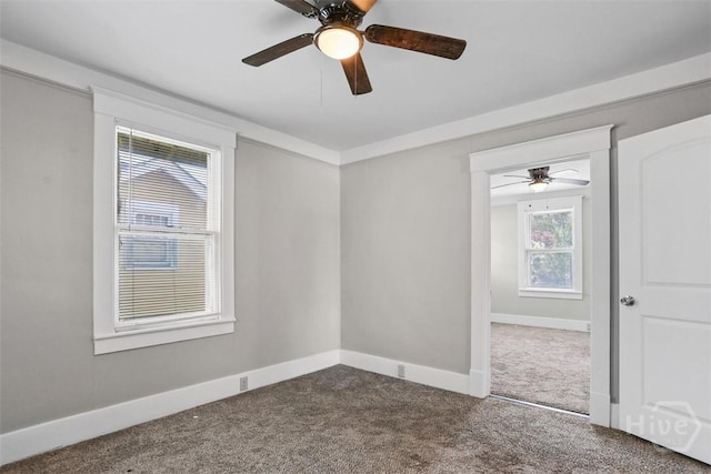 1104 E 40th St, Savannah, GA 31404 - spare room featuring dark carpet and ceiling fan
