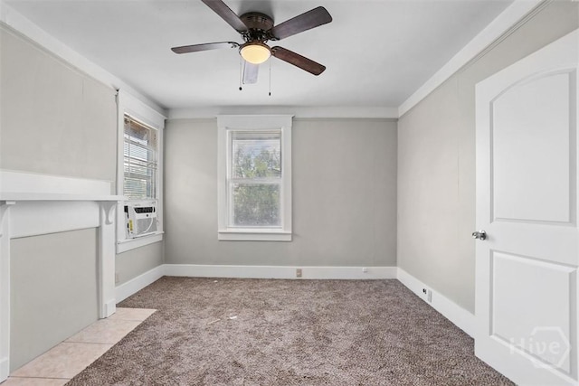1104 E 40th St, Savannah, GA 31404 - spare room featuring light colored carpet, cooling unit, and a ceiling fan