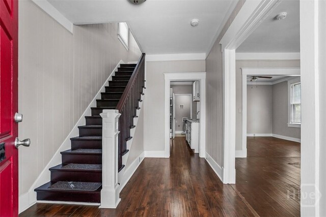 1104 E 40th St, Savannah, GA 31404 - foyer entrance with stairway, wood-type flooring, ceiling fan, and crown molding