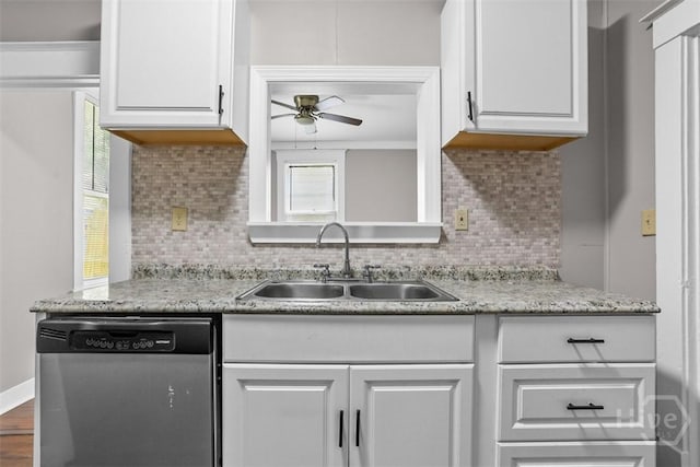 1104 E 40th St, Savannah, GA 31404 - kitchen featuring dishwasher, a ceiling fan, white cabinets, and backsplash