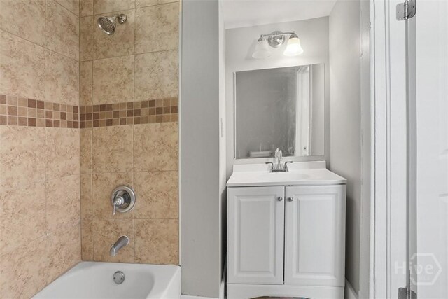 1104 E 40th St, Savannah, GA 31404 - full bath featuring vanity and washtub / shower combination