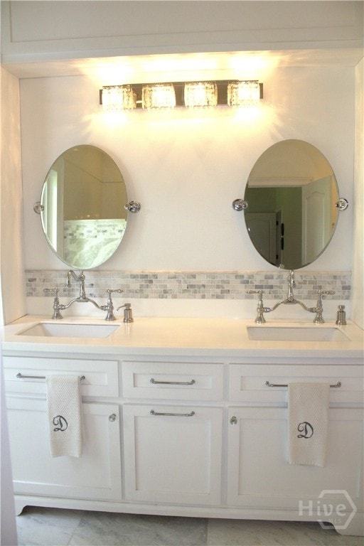 2766 Fort Mcallister Rd, Richmond Hill, GA 31324 - full bath featuring double vanity and tasteful backsplash