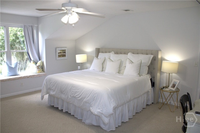 2766 Fort Mcallister Rd, Richmond Hill, GA 31324 - bedroom featuring light colored carpet, vaulted ceiling, and a ceiling fan