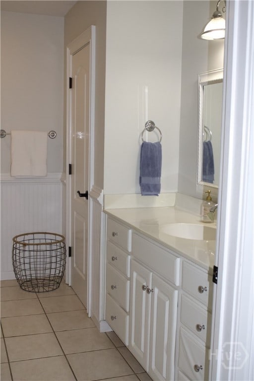 2766 Fort Mcallister Rd, Richmond Hill, GA 31324 - bathroom featuring tile patterned flooring, vanity, and wainscoting