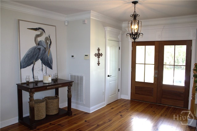2766 Fort Mcallister Rd, Richmond Hill, GA 31324 - entryway featuring wood finished floors, french doors, crown molding, and a chandelier