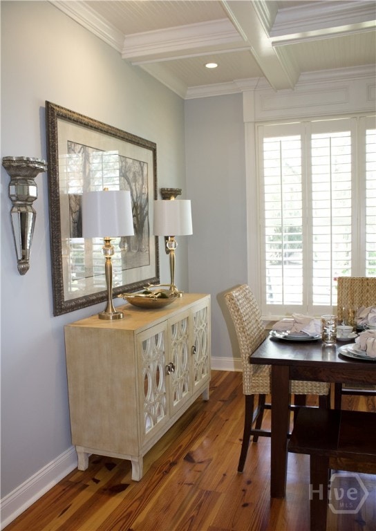 2766 Fort Mcallister Rd, Richmond Hill, GA 31324 - dining space featuring wood finished floors, beamed ceiling, crown molding, and coffered ceiling