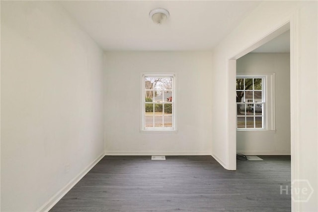 1321/1323 E 55th St, Savannah, GA 31404 - empty room featuring dark wood finished floors