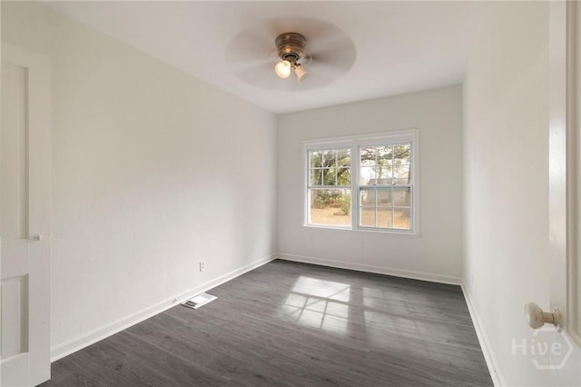 1321/1323 E 55th St, Savannah, GA 31404 - empty room with ceiling fan and dark wood-type flooring