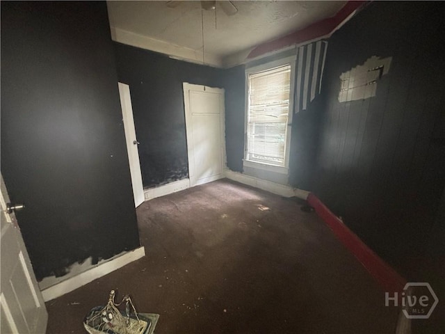 710 W 38th St, Savannah, GA 31415 - unfurnished bedroom with carpet floors and a ceiling fan