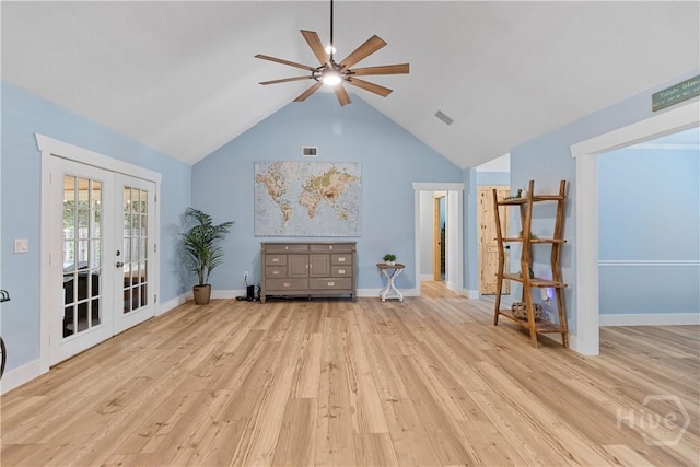 115 Coquena Cir E, Savannah, GA 31410 - unfurnished living room with ceiling fan, french doors, wood finished floors, and high vaulted ceiling