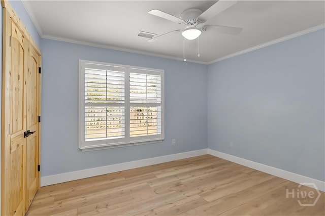 115 Coquena Cir E, Savannah, GA 31410 - unfurnished bedroom featuring light wood-type flooring, ornamental molding, a closet, and ceiling fan