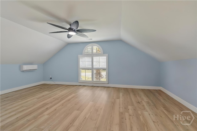 115 Coquena Cir E, Savannah, GA 31410 - additional living space featuring a wall mounted air conditioner, light wood-style flooring, ceiling fan, and vaulted ceiling