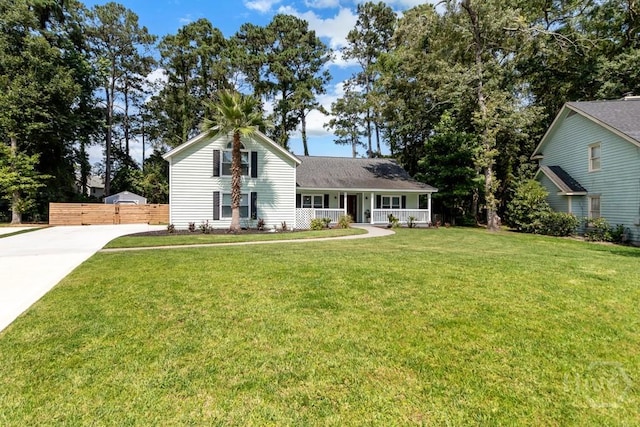 115 Coquena Cir E, Savannah, GA 31410 - traditional home featuring covered porch and driveway