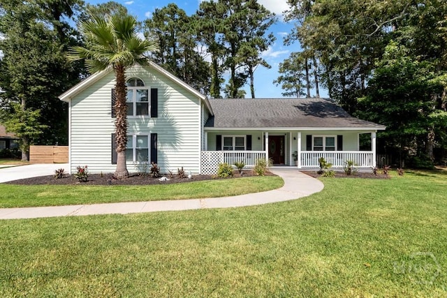 115 Coquena Cir E, Savannah, GA 31410 - view of front of home featuring covered porch, a front lawn, and a shingled roof