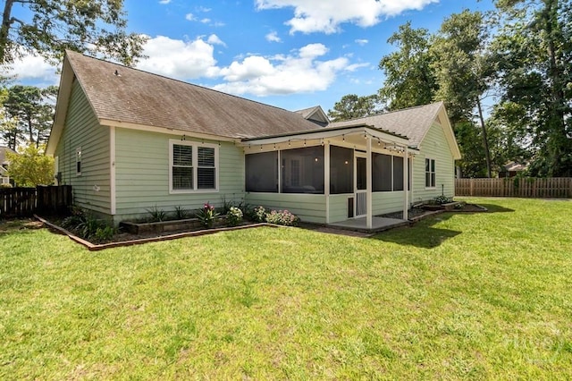 115 Coquena Cir E, Savannah, GA 31410 - rear view of house with a shingled roof and a sunroom