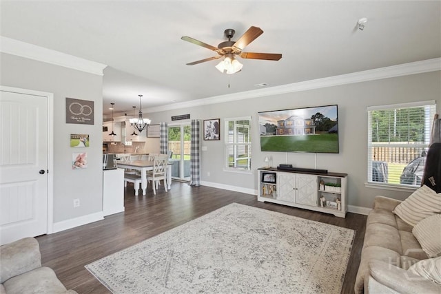 105 Summer Station Dr, Guyton, GA 31312 - living area with crown molding, a chandelier, ceiling fan, and dark wood-style floors
