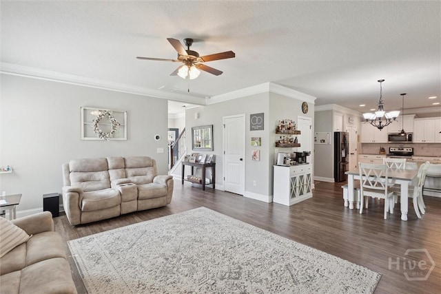 105 Summer Station Dr, Guyton, GA 31312 - living room with ceiling fan, dark wood-style floors, stairway, ornamental molding, and a chandelier