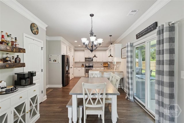 105 Summer Station Dr, Guyton, GA 31312 - dining room featuring a chandelier, ornamental molding, dark wood finished floors, and recessed lighting
