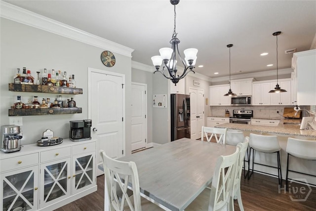 105 Summer Station Dr, Guyton, GA 31312 - dining room featuring ornamental molding, a chandelier, dark wood-style floors, and recessed lighting