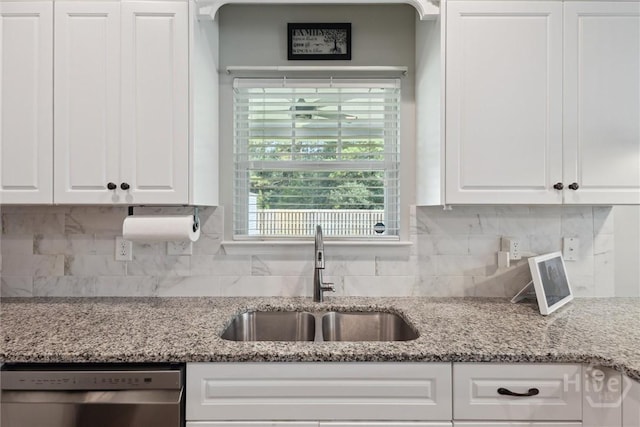 105 Summer Station Dr, Guyton, GA 31312 - kitchen featuring stainless steel dishwasher, white cabinets, tasteful backsplash, and light stone countertops
