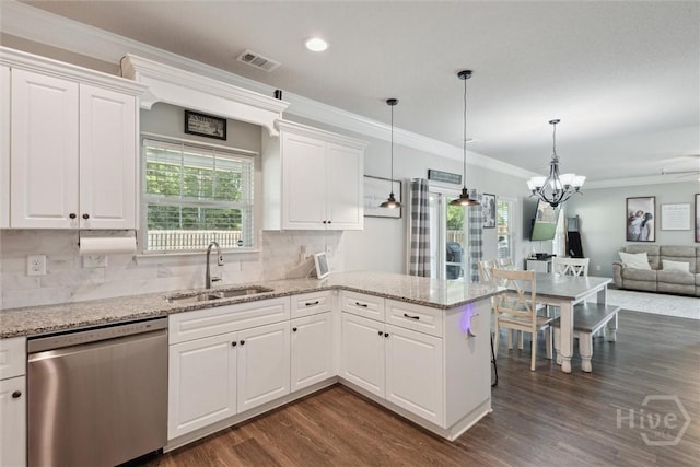 105 Summer Station Dr, Guyton, GA 31312 - kitchen featuring dishwasher, dark wood-type flooring, a chandelier, crown molding, and white cabinets