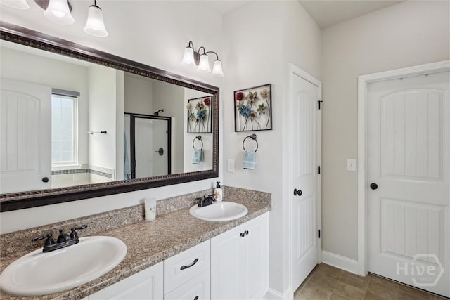 105 Summer Station Dr, Guyton, GA 31312 - bathroom with a shower stall, double vanity, and tile patterned floors