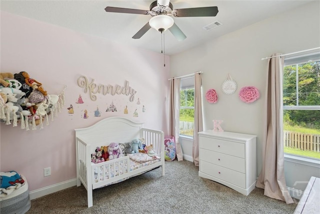 105 Summer Station Dr, Guyton, GA 31312 - bedroom featuring a crib, multiple windows, carpet flooring, and ceiling fan