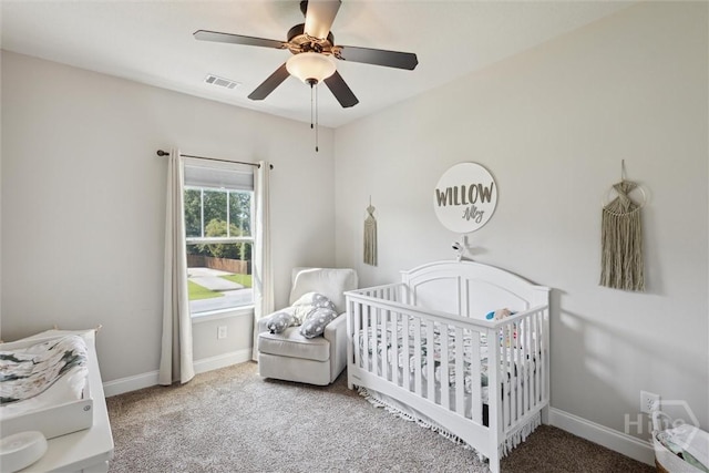 105 Summer Station Dr, Guyton, GA 31312 - bedroom featuring a crib, carpet floors, and ceiling fan